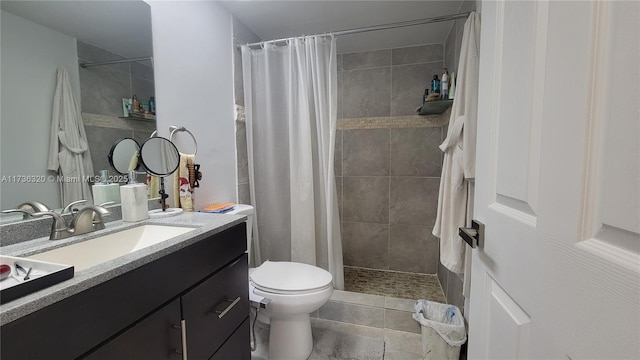 bathroom featuring tile patterned floors, vanity, toilet, and a shower with shower curtain