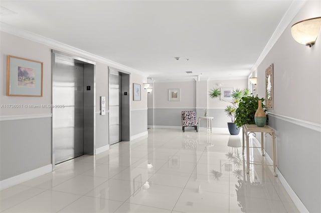 corridor with crown molding, elevator, and light tile patterned flooring