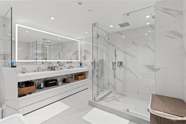 bathroom featuring vanity and an enclosed shower