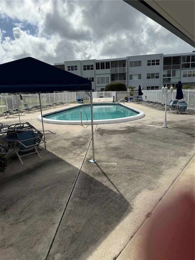 view of pool with a patio area