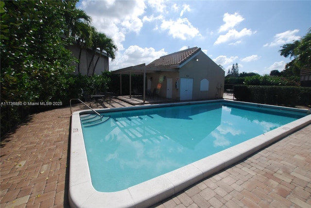 view of pool with a patio area