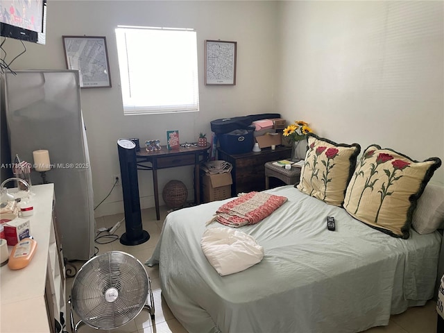 bedroom with light tile patterned flooring