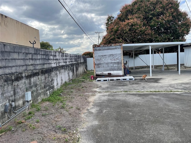 view of car parking featuring a carport