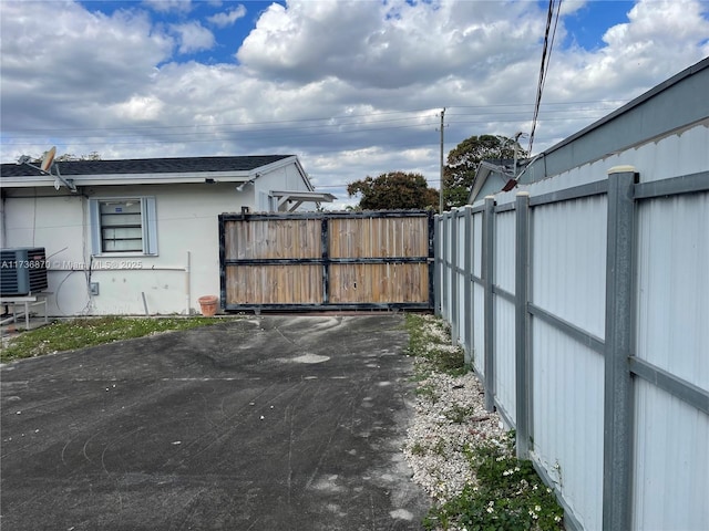 exterior space featuring central AC unit