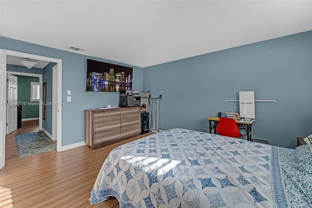 bedroom featuring hardwood / wood-style flooring