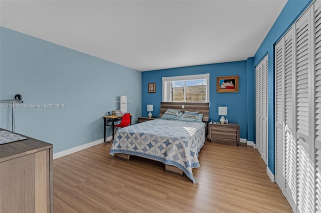 bedroom with light hardwood / wood-style flooring