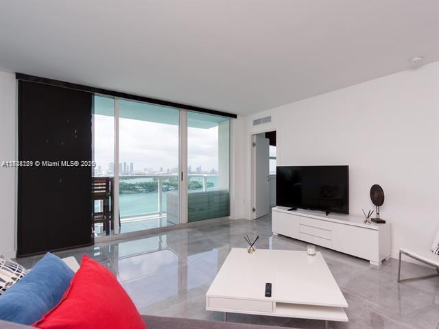 living room with expansive windows