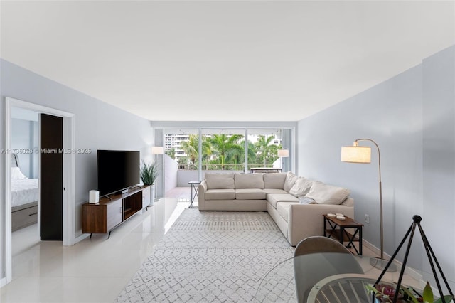 155 Ocean Lane Dr Unit 407, Key Biscayne, FL 33149 - living room with light tile patterned floors and baseboards