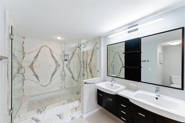 155 Ocean Lane Dr Unit 407, Key Biscayne, FL 33149 - full bathroom with a marble finish shower, double vanity, and toilet