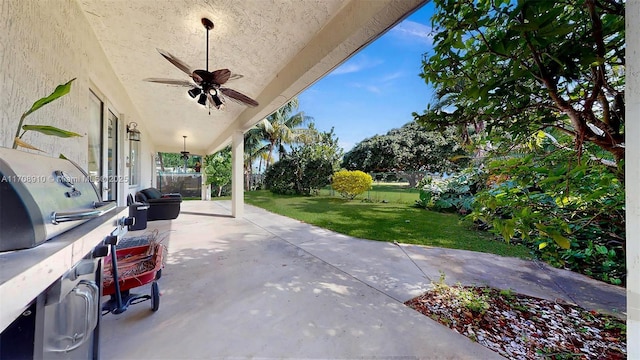 view of patio with ceiling fan