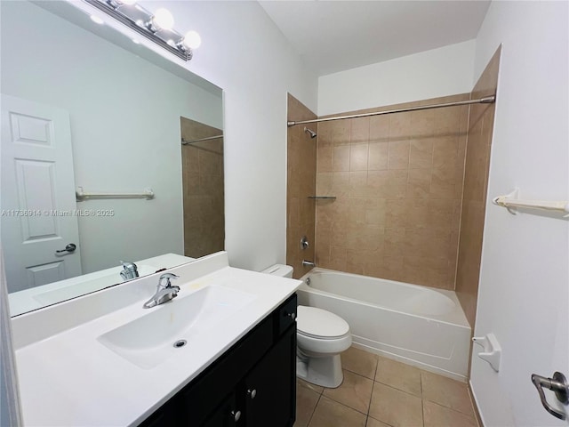 full bath featuring tile patterned flooring, shower / bathing tub combination, vanity, and toilet