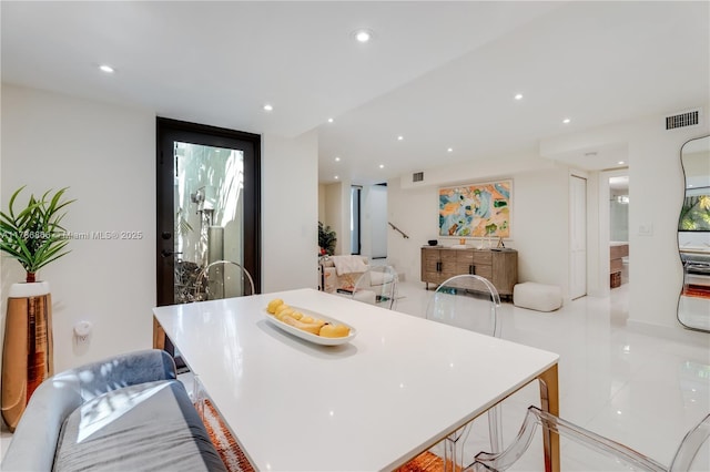 kitchen with a breakfast bar and a kitchen island