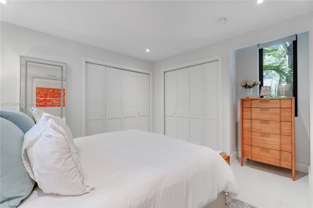 bedroom featuring two closets