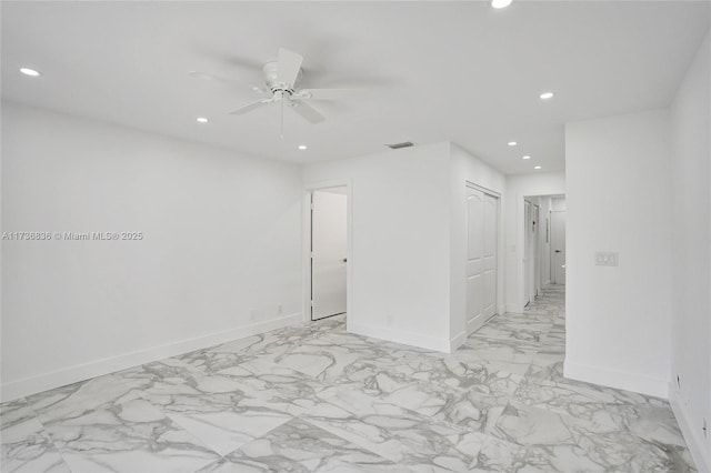 spare room featuring baseboards, visible vents, ceiling fan, and recessed lighting