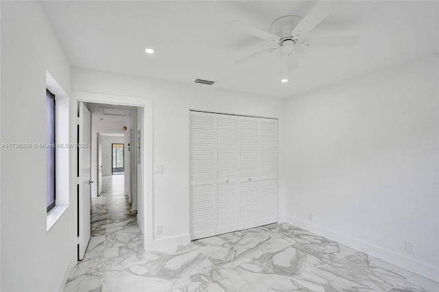 unfurnished bedroom featuring recessed lighting, visible vents, baseboards, marble finish floor, and a closet