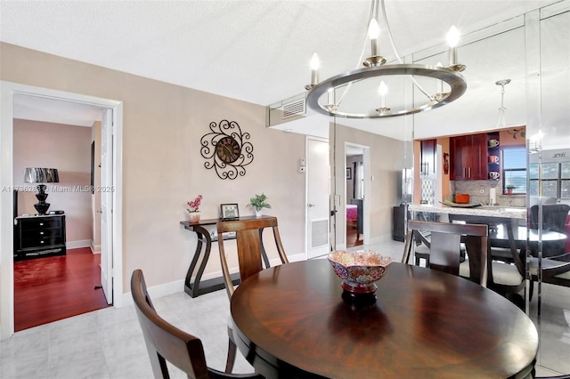 dining room with an inviting chandelier