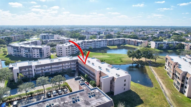 birds eye view of property featuring a water view