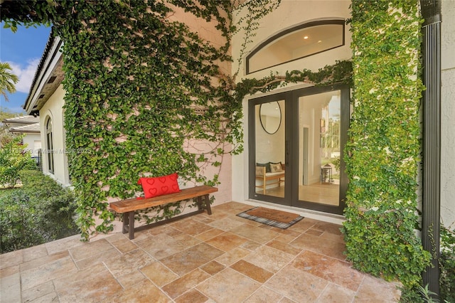 entrance to property featuring french doors