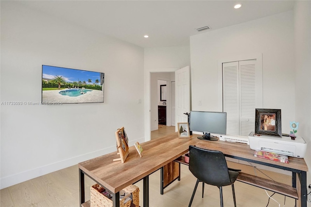 office space featuring light wood-type flooring