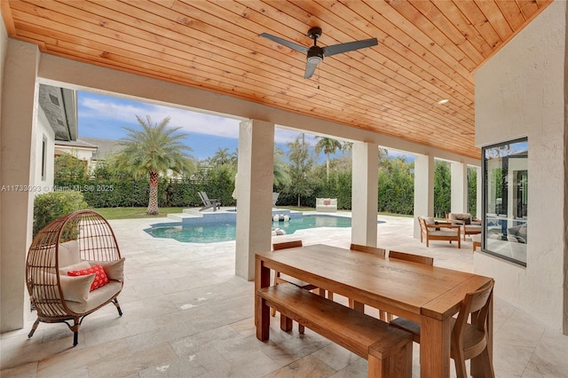 exterior space with an outdoor living space, a patio, and ceiling fan