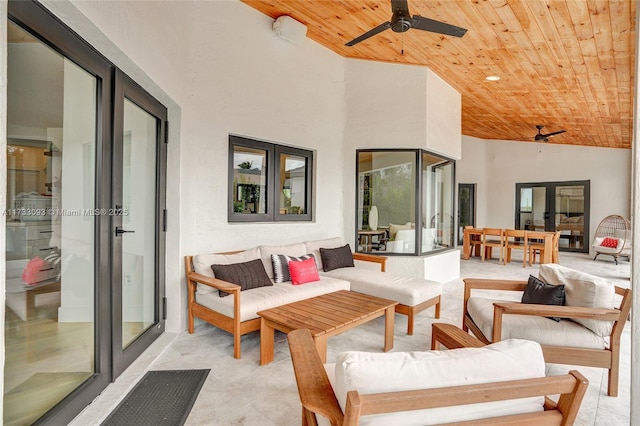 view of patio / terrace with an outdoor hangout area, ceiling fan, and french doors