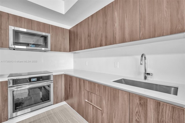 kitchen featuring sink and appliances with stainless steel finishes