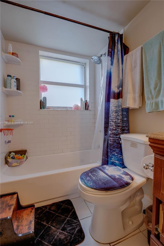 full bathroom with vanity, toilet, tile patterned flooring, and shower / bath combo with shower curtain