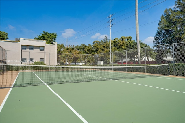 view of sport court featuring basketball hoop