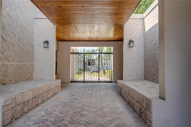 interior space featuring wooden ceiling