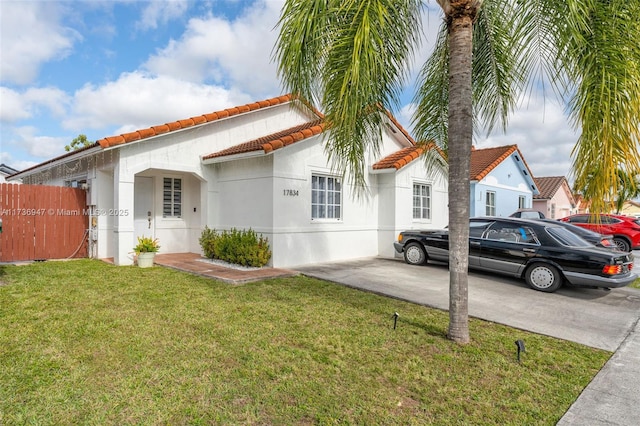 view of front of property with a front lawn