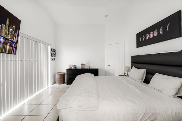 bedroom with light tile patterned flooring