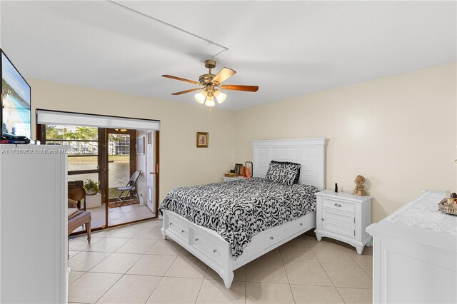 tiled bedroom featuring access to exterior, french doors, and ceiling fan