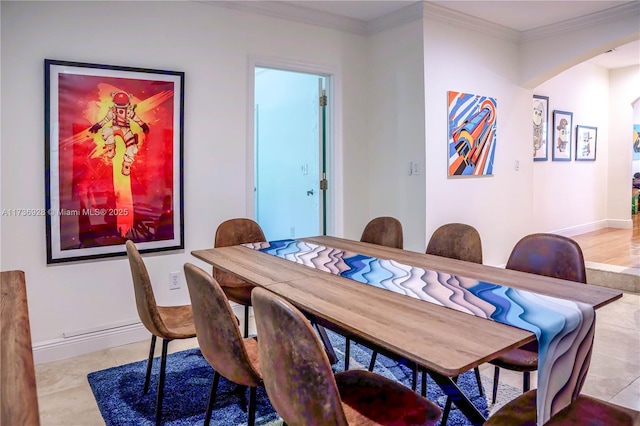 dining area with ornamental molding