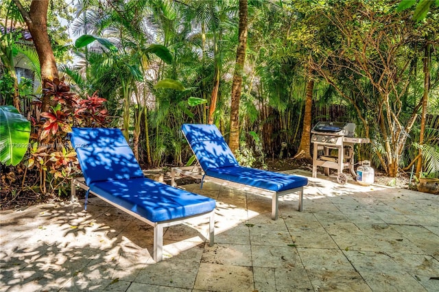 view of patio with a grill