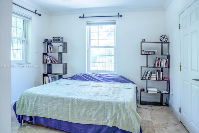 bedroom with crown molding