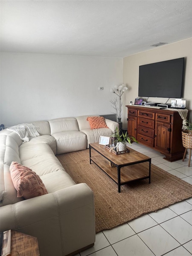 living room featuring light tile patterned flooring