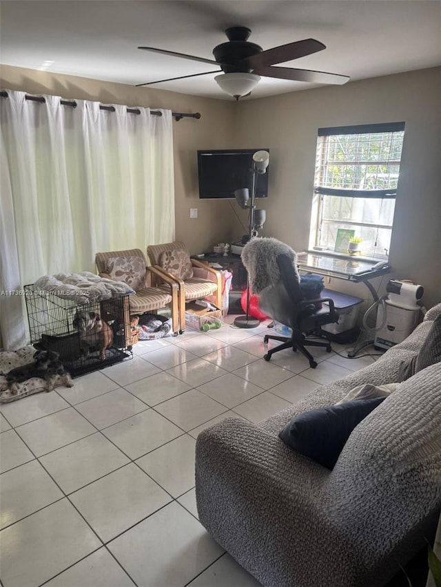 tiled living room featuring ceiling fan