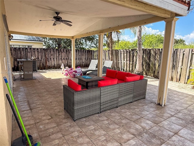 view of patio featuring an outdoor living space and ceiling fan