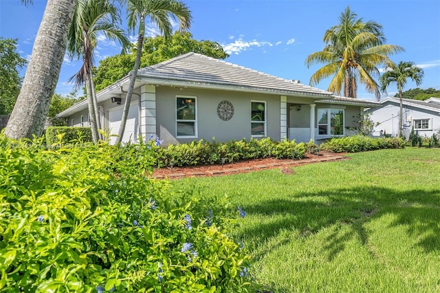 view of front of property with a front lawn