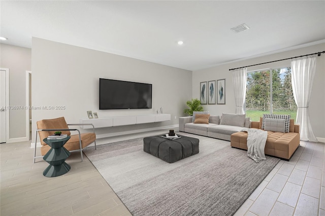 living room with light hardwood / wood-style floors