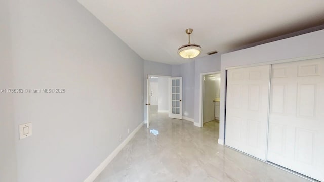 corridor featuring french doors