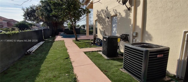 exterior space featuring a patio and a yard