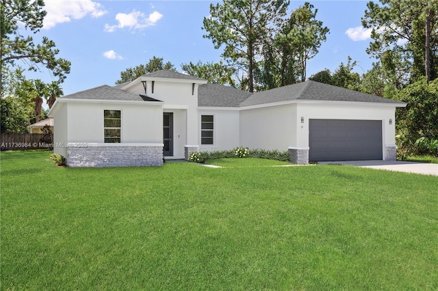 view of front of house featuring stucco siding, concrete driveway, a front yard, a garage, and stone siding