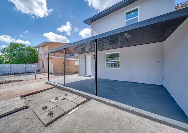 view of patio featuring a carport