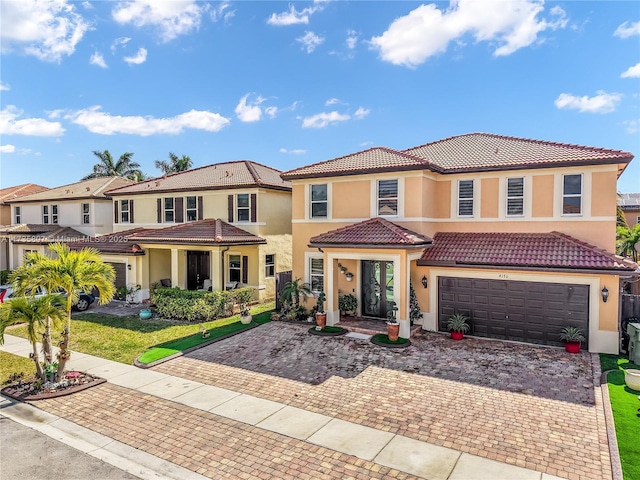 mediterranean / spanish-style house featuring a garage