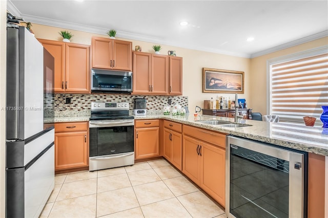 kitchen featuring stainless steel appliances, beverage cooler, light stone countertops, and decorative backsplash