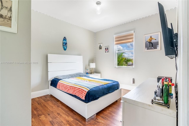 bedroom featuring dark hardwood / wood-style floors