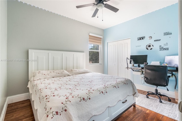 bedroom with ceiling fan, dark hardwood / wood-style floors, and a closet