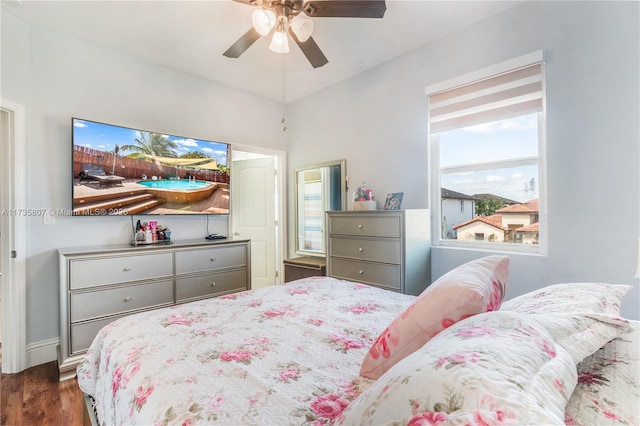 bedroom featuring dark hardwood / wood-style flooring and ceiling fan