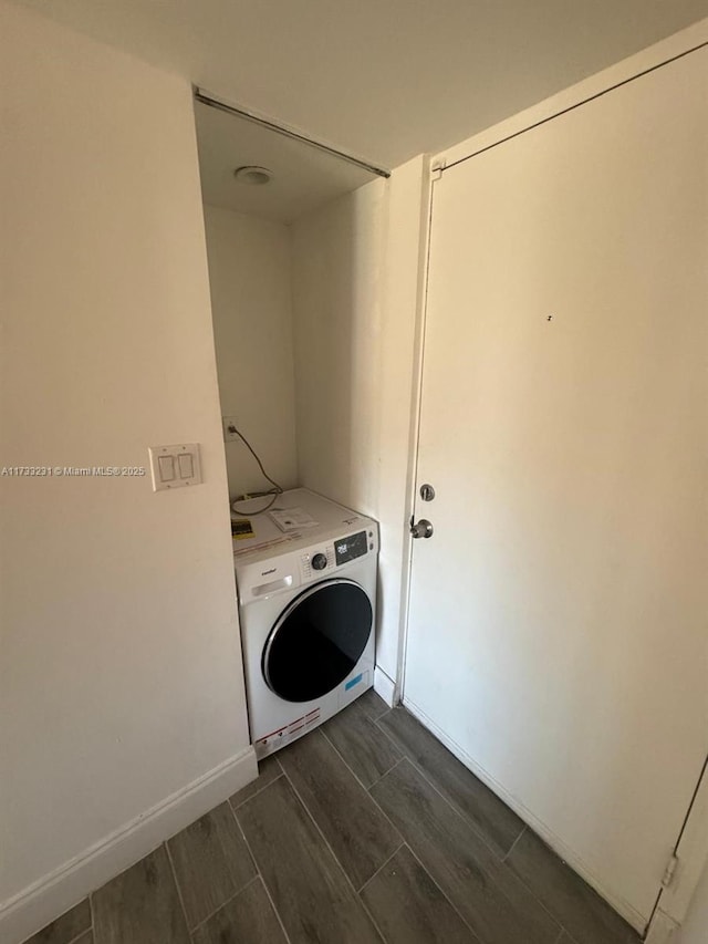 laundry room featuring washer / dryer